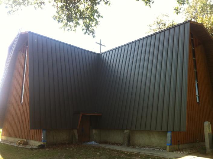 Burnish slate metal roof install.